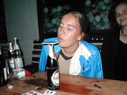 Carine blowing the cards